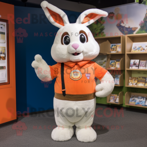 Peach Wild Rabbit mascot costume character dressed with a T-Shirt and Lapel pins