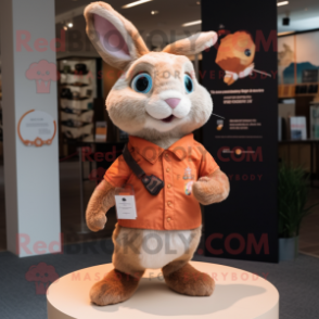 Peach Wild Rabbit mascot costume character dressed with a T-Shirt and Lapel pins