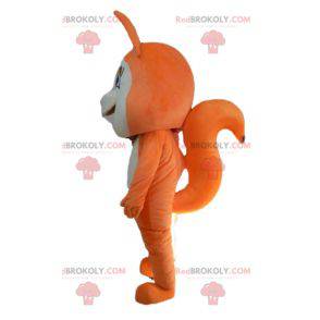 Linda y conmovedora mascota zorro naranja y blanco -