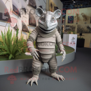 Gray Armadillo mascot costume character dressed with a Romper and Foot pads