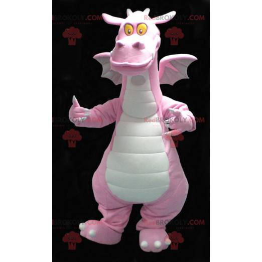 Mascotte drago rosa e bianco carino e sorridente -