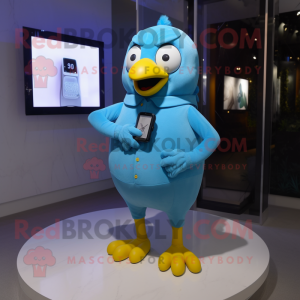 Sky Blue Canary mascot costume character dressed with a Shorts and Smartwatches
