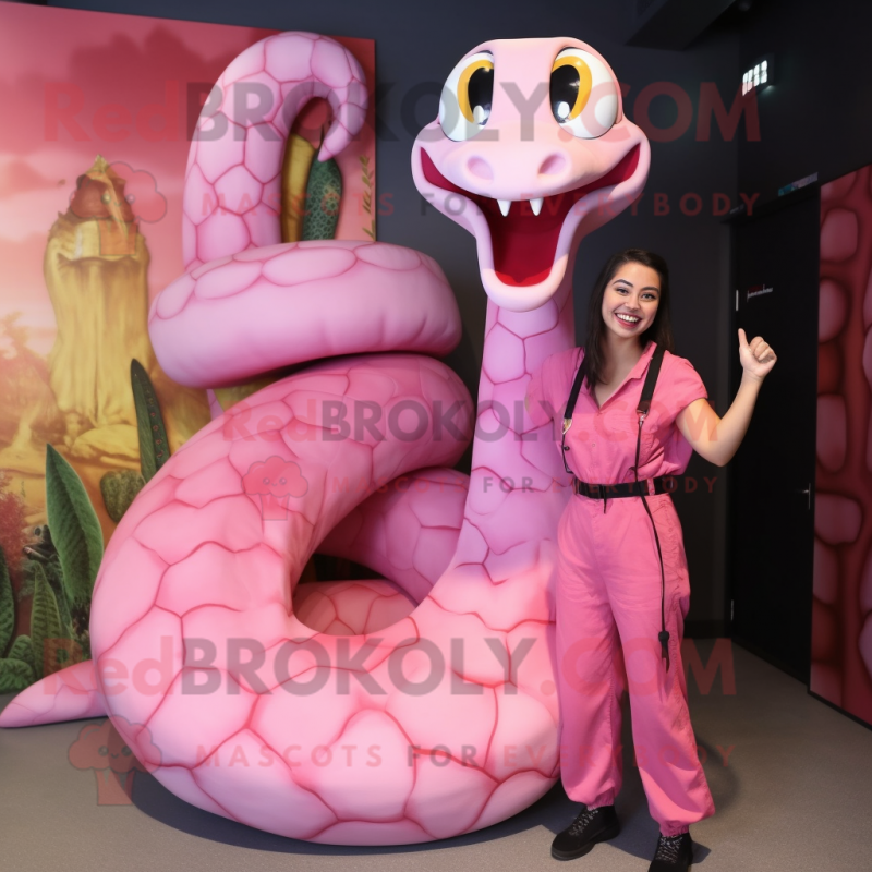 Pink Anaconda mascot costume character dressed with a Romper and Hairpins