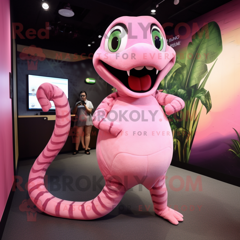 Pink Anaconda mascot costume character dressed with a Romper and Hairpins Pink Anaconda mascot costume character dressed with a Romper and Hairpins