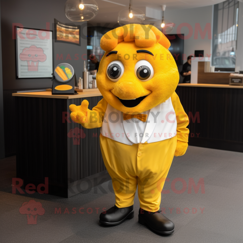 Yellow Fish And Chips mascot costume character dressed with a Culottes and Tie pins Yellow Fish And Chips mascot costume character dressed with a Culottes and Tie pins