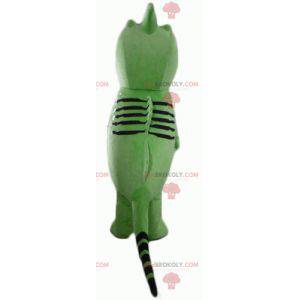 Mascota de pez criatura verde y negro - Redbrokoly.com