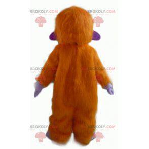 Mascote macaco laranja roxo e branco todo peludo -