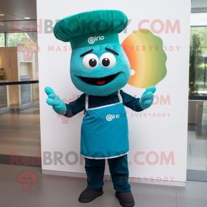 Turquoise Pesto Pasta mascot costume character dressed with a Chinos and Hats