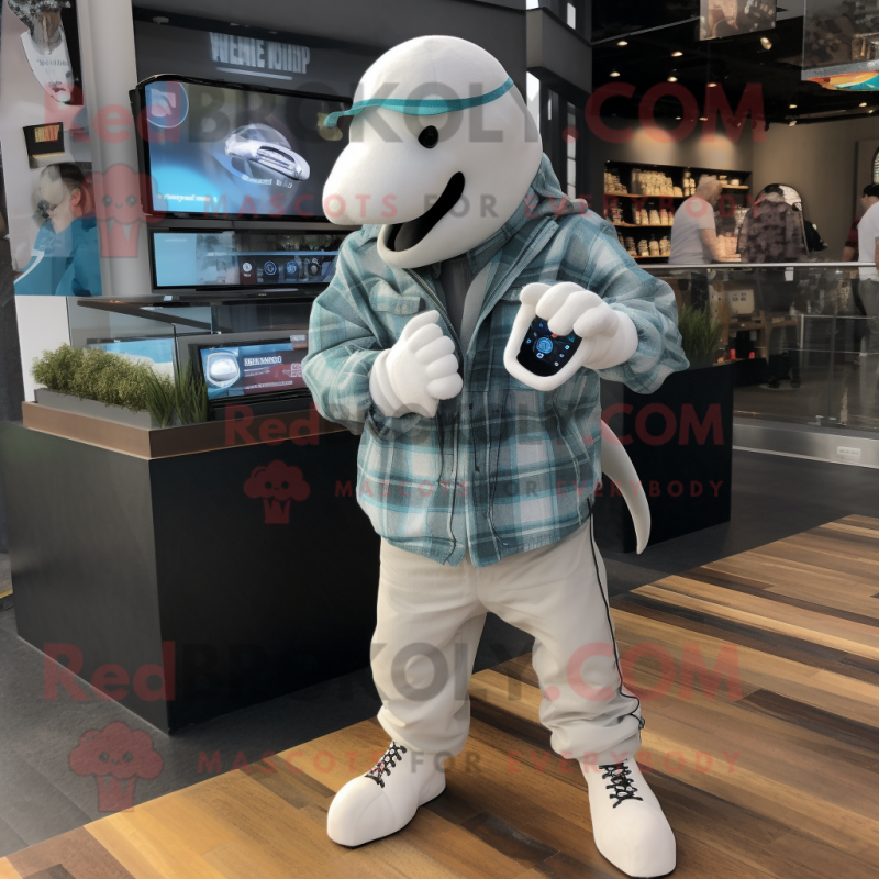 White Dolphin mascot costume character dressed with a Flannel Shirt and Smartwatches