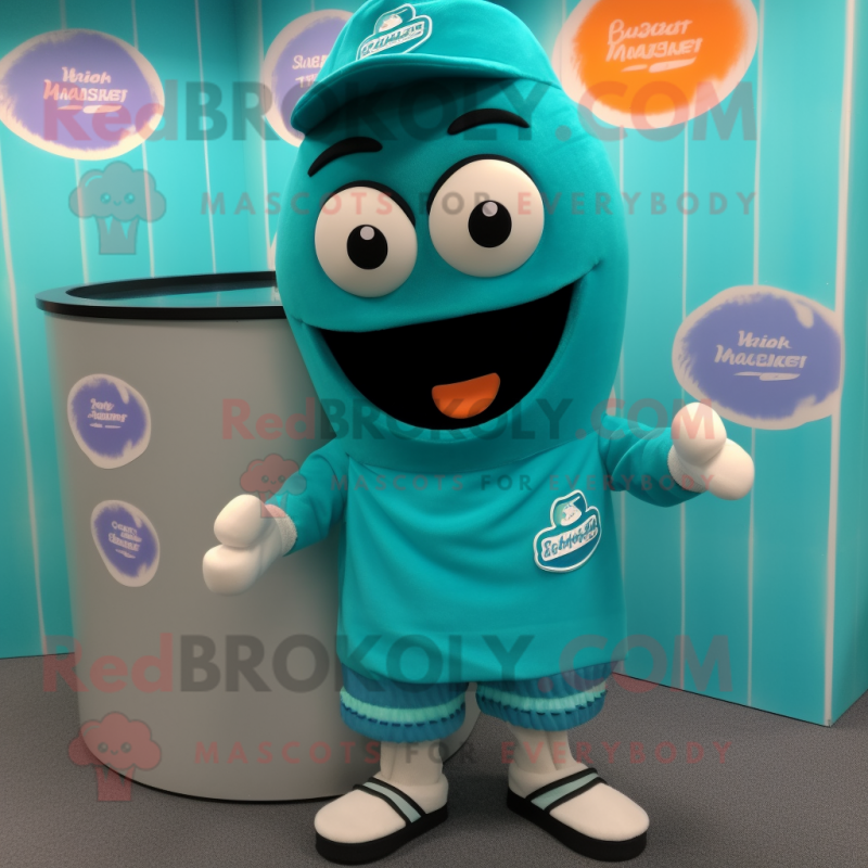 Teal Scented Candle mascot costume character dressed with a Board Shorts and Rings Teal Scented Candle mascot costume character dressed with a Board Shorts and Rings