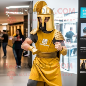 Gold Spartan Soldier mascot costume character dressed with a Waistcoat and Caps