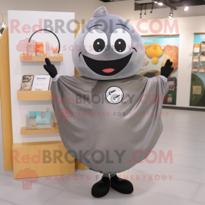 Gray Donut mascot costume character dressed with a Cover-up and Tote bags