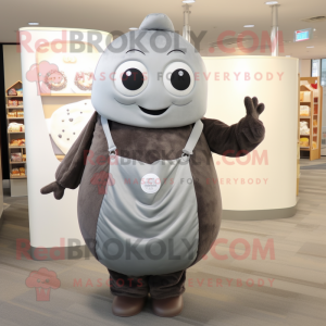 Gray Donut mascot costume character dressed with a Cover-up and Tote bags