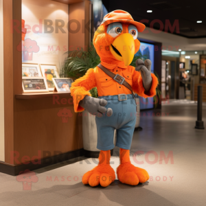 Orange Parrot mascot costume character dressed with a Mom Jeans and Belts