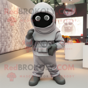 Gray Commando mascot costume character dressed with a Hoodie and Clutch bags