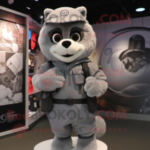 Gray Commando mascot costume character dressed with a Hoodie and Clutch bags