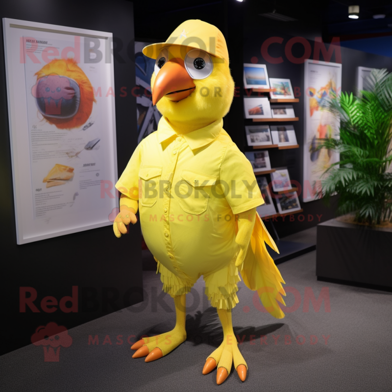 Yellow Parrot mascot costume character dressed with a Poplin Shirt and Caps