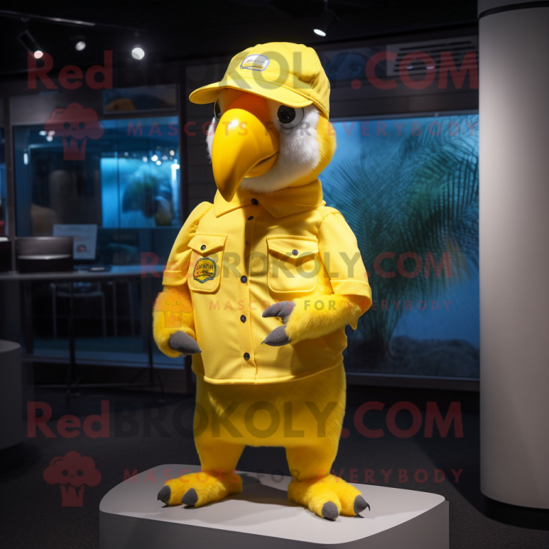 Yellow Parrot mascot costume character dressed with a Poplin Shirt and Caps