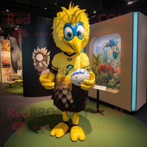 Yellow Peacock mascot costume character dressed with a Rugby Shirt and Anklets