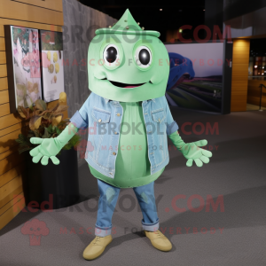 Green Stingray mascot costume character dressed with a Denim Shirt and Tie pins
