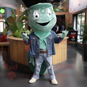 Green Stingray mascot costume character dressed with a Denim Shirt and Tie pins