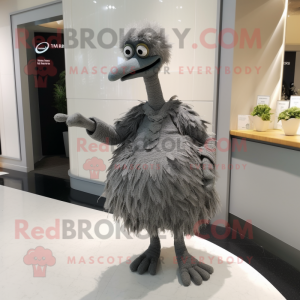 Gray Ostrich mascot costume character dressed with a Wrap Dress and Cufflinks