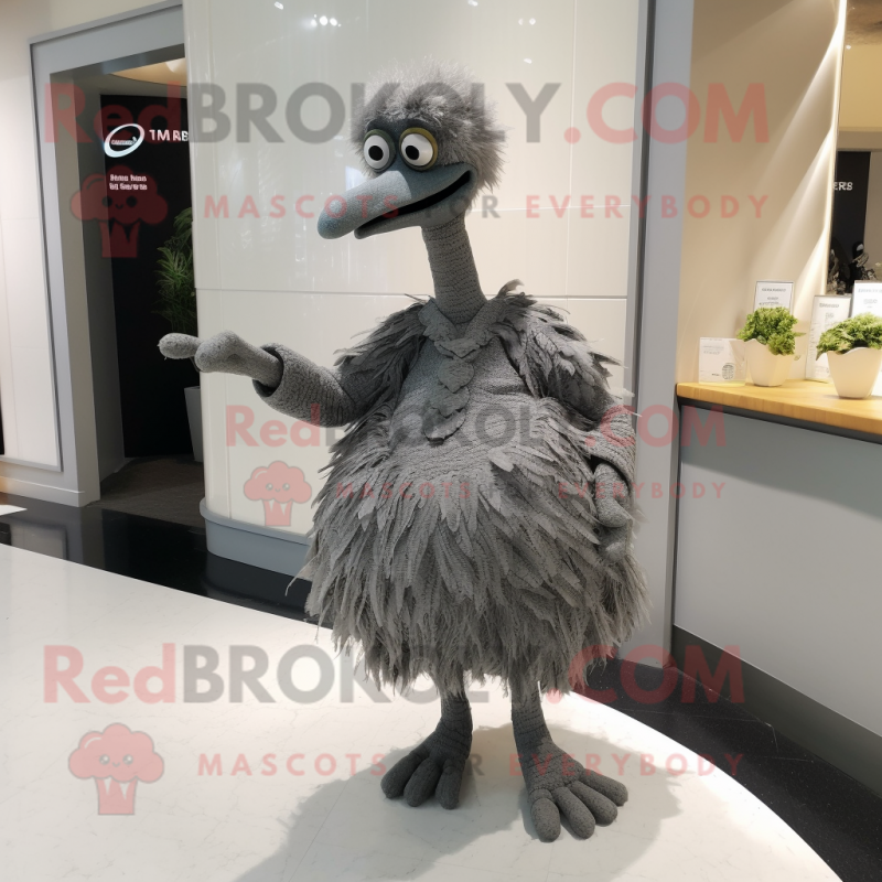 Gray Ostrich mascot costume character dressed with a Wrap Dress and Cufflinks Gray Ostrich mascot costume character dressed with a Wrap Dress and Cufflinks