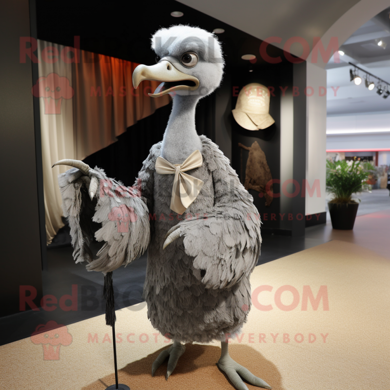 Gray Ostrich mascot costume character dressed with a Wrap Dress and Cufflinks