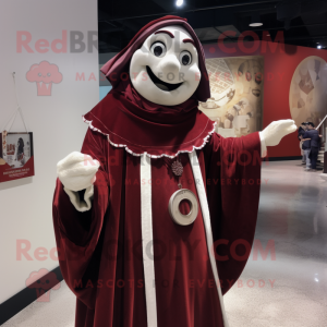 Maroon Mime mascot costume character dressed with a Coat and Shawl pins