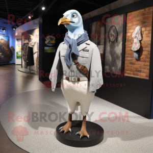 White Passenger Pigeon mascot costume character dressed with a Jeans and Shawl pins