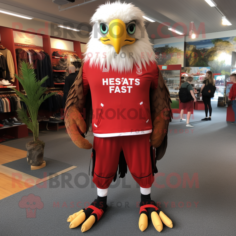 Red Haast'S Eagle mascot costume character dressed with a Joggers and Shoe laces Red Haast'S Eagle mascot costume character dressed with a Joggers and Shoe laces