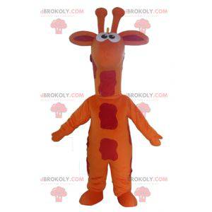 Obří oranžově červené a žluté žirafí maskot - Redbrokoly.com