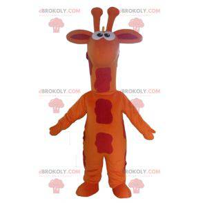 Mascote gigante girafa laranja vermelha e amarela -