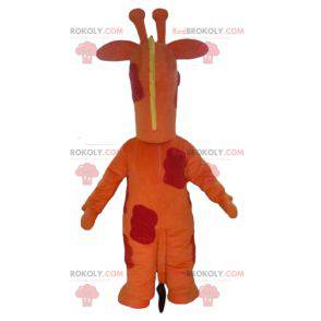 Riesiges orangerotes und gelbes Giraffenmaskottchen -