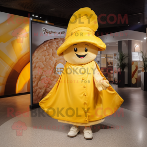 Yellow Croissant mascot costume character dressed with a Wrap Skirt and Hat pins