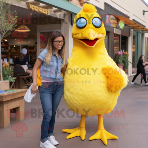 Yellow Blackbird mascot costume character dressed with a Mom Jeans and Suspenders