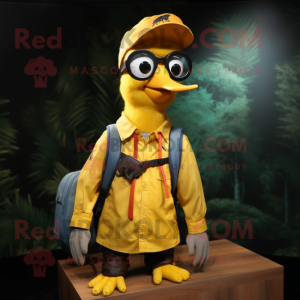 Yellow Woodpecker mascot costume character dressed with a Cargo Shorts and Eyeglasses