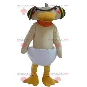 Mascot pato beige en una cáscara de huevo - Redbrokoly.com