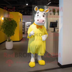 Yellow Cow mascot costume character dressed with a Playsuit and Clutch bags