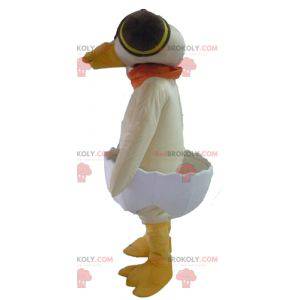 Mascotte de canard beige dans une coquille d'œuf -