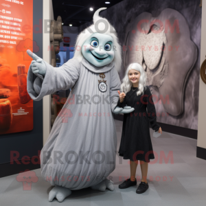 Gray Witch mascot costume character dressed with a Wrap Dress and Watches