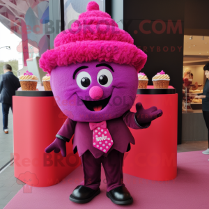 Magenta Cupcake mascot costume character dressed with a Suit and Shawls