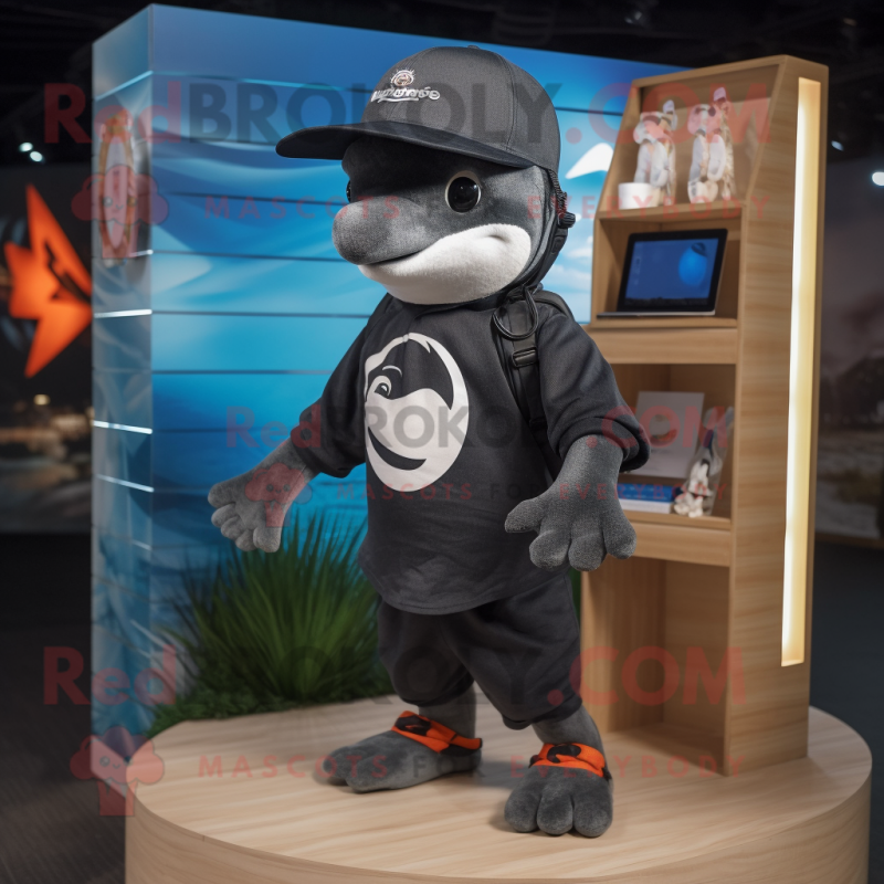 Black Dolphin mascot costume character dressed with a Board Shorts and Berets Black Dolphin mascot costume character dressed with a Board Shorts and Berets