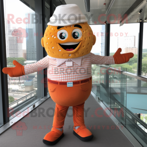 Orange Cupcake mascot costume character dressed with a Button-Up Shirt and Tote bags