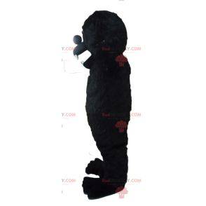 Mascote gorila negro parecendo feroz - Redbrokoly.com