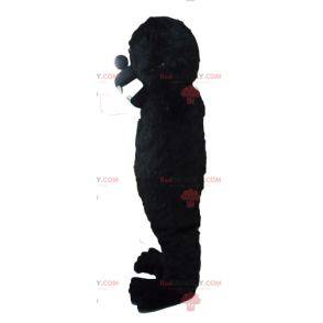 Maskotka czarny goryl wyglądający zaciekle - Redbrokoly.com