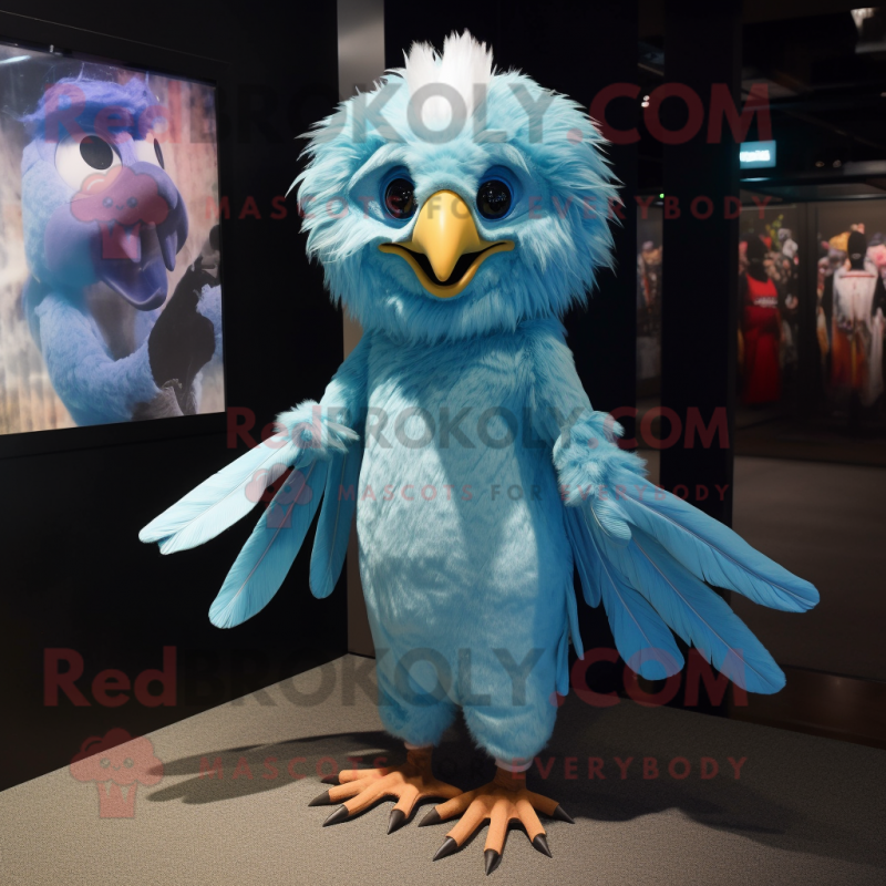 Cyan Harpy mascot costume character dressed with a Culottes and Keychains Cyan Harpy mascot costume character dressed with a Culottes and Keychains