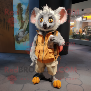 Peach Aye-Aye mascot costume character dressed with a Cargo Shorts and Shawl pins