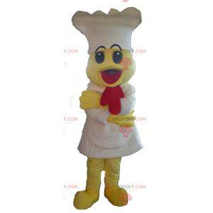 Mascot pollito amarillo con un delantal y un sombrero blanco -