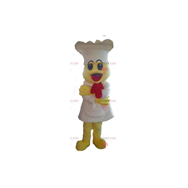 Mascot pollito amarillo con un delantal y un sombrero blanco -